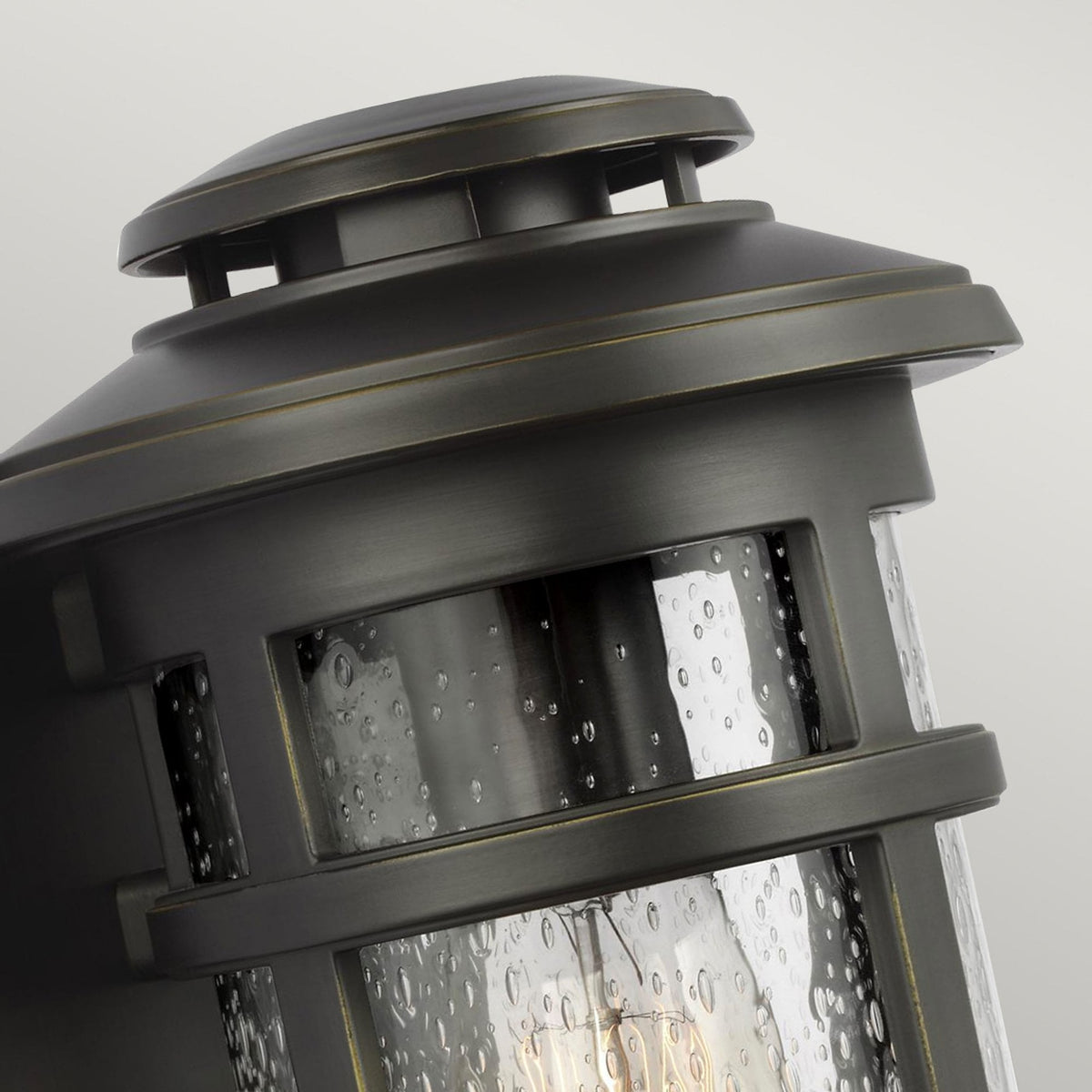 Newport IP44 Coastal Small Wall Lantern in Antique Bronze with Clear Seeded Glass