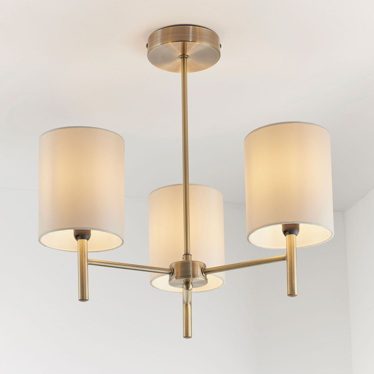 Brio Three Light Semi Flush Ceiling Light in Antique Brass