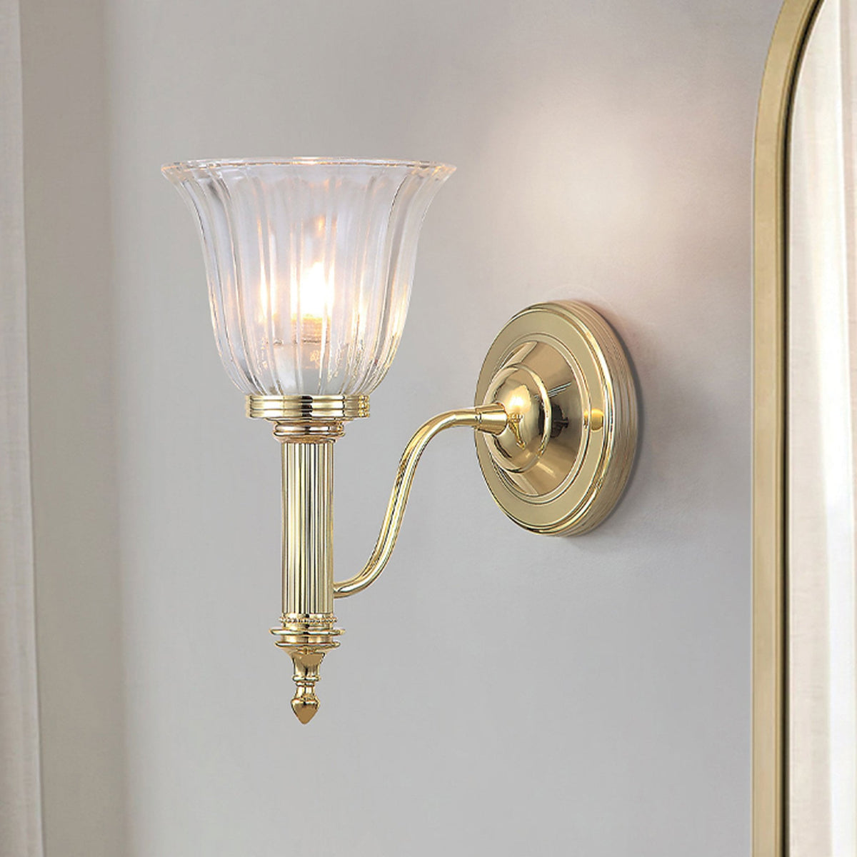 Carroll IP44 Bathroom Wall Light in Polished Brass