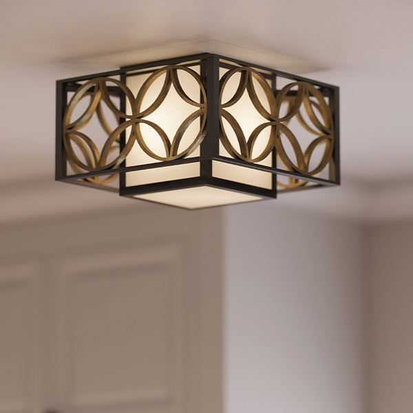 Remy Flush Mount Light in Bronze and Gold