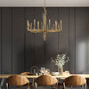 Spyre Six Light Chandelier in Champagne Gold