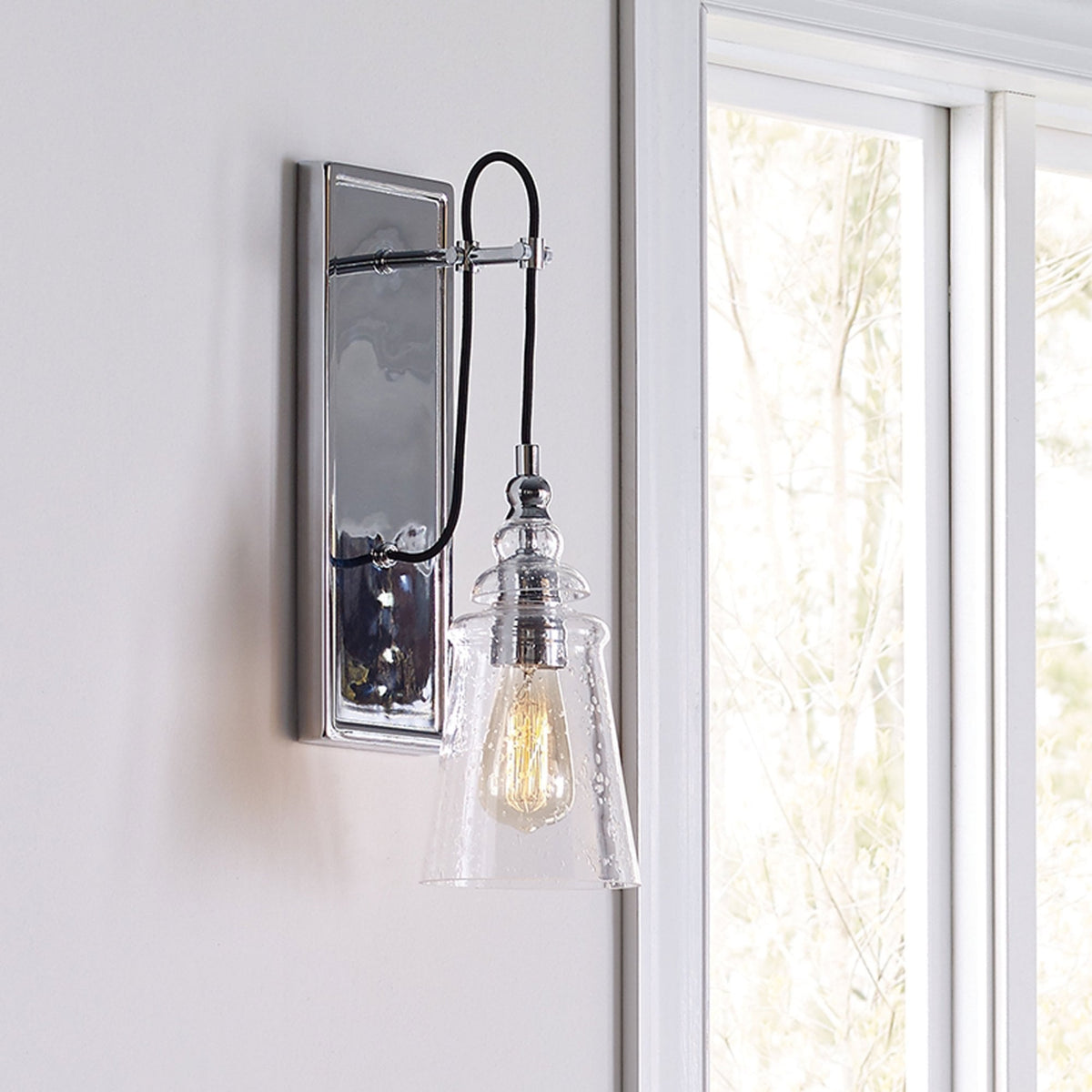 Loras Wall Light in Polished Chrome with Seeded Clear Glass