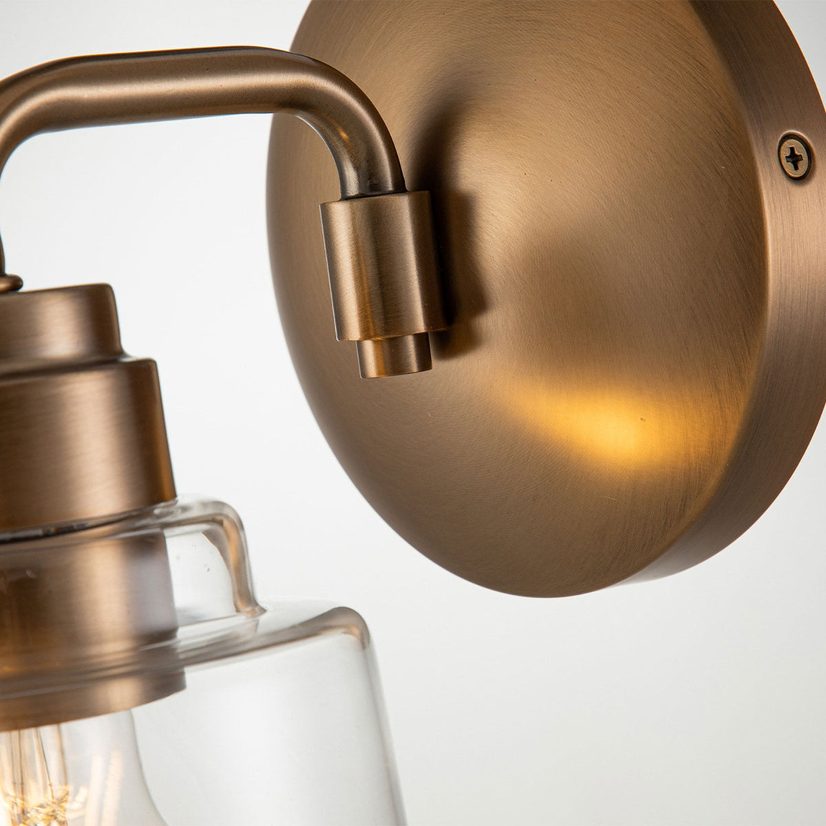 Aivian Single Arm Wall Light in Weathered Brass with Clear Glass