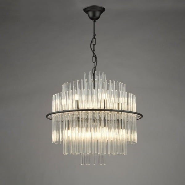 A modern chandelier with multiple clear glass rods arranged in a circular, tiered design, emitting a warm glow.
