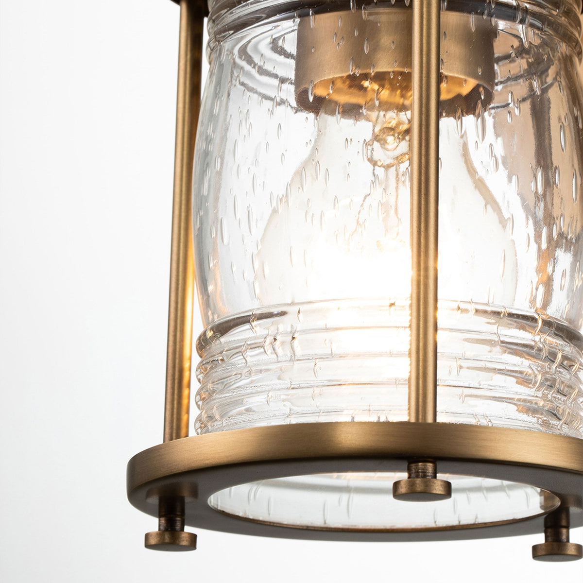 Ashland Bay Single IP44 Wall Light in Natural Brass with Clear Seedy Ribbed Glass