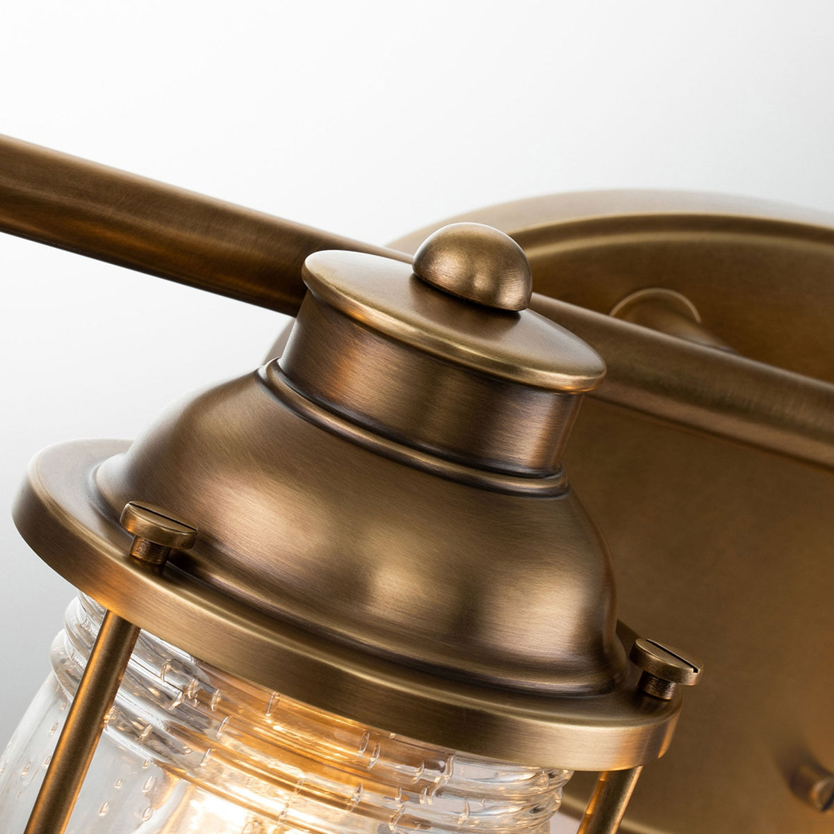 Ashland Bay Quadruple IP44 Wall Light in Natural Brass with Clear Seedy Ribbed Glass