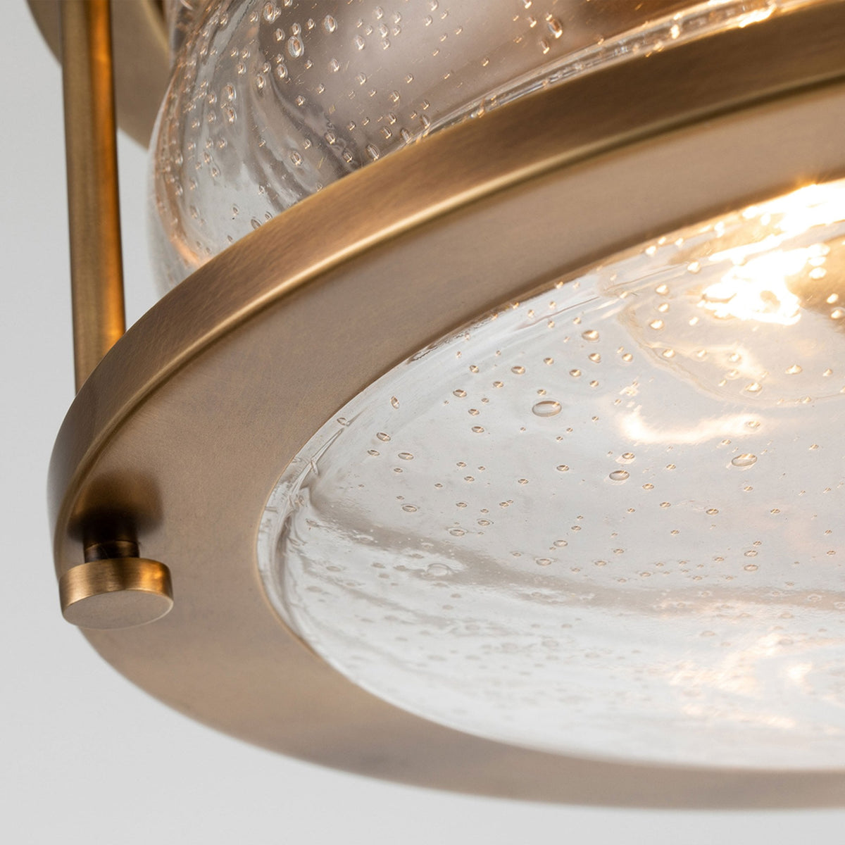 Ashland Bay IP44 Ceiling Light in Natural Brass with Clear Seedy Ribbed Glass