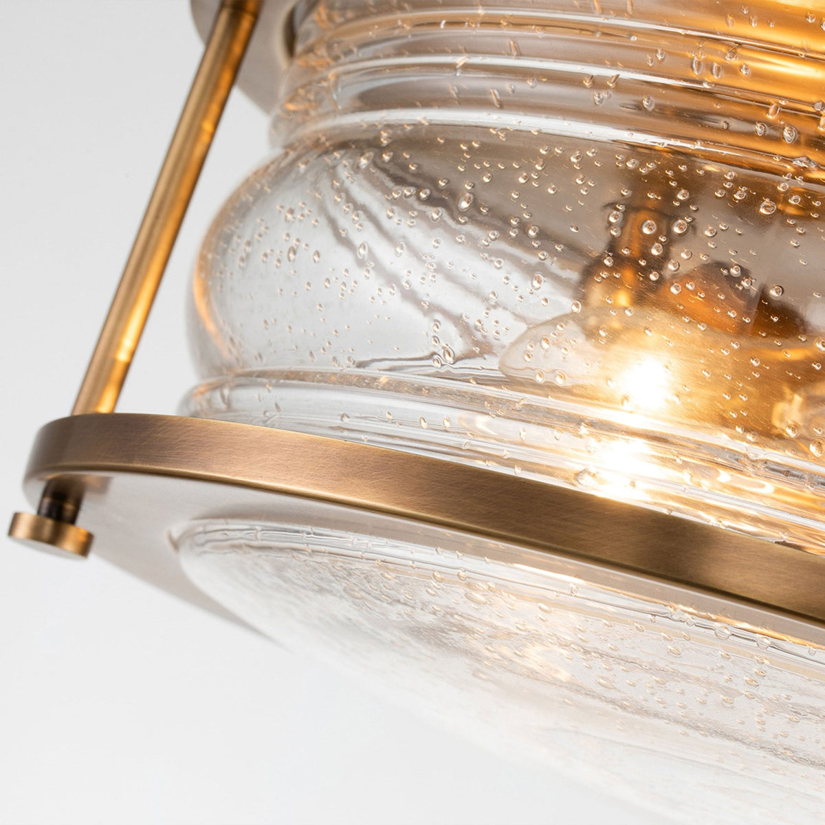 Ashland Bay IP44 Ceiling Light in Natural Brass with Clear Seedy Ribbed Glass