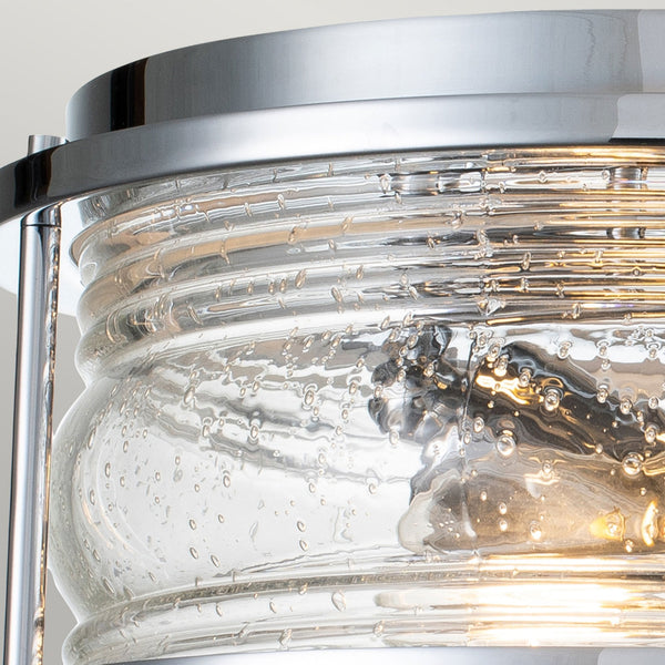 A close-up showing the seeded glass and the light bulb inside the fixture.
