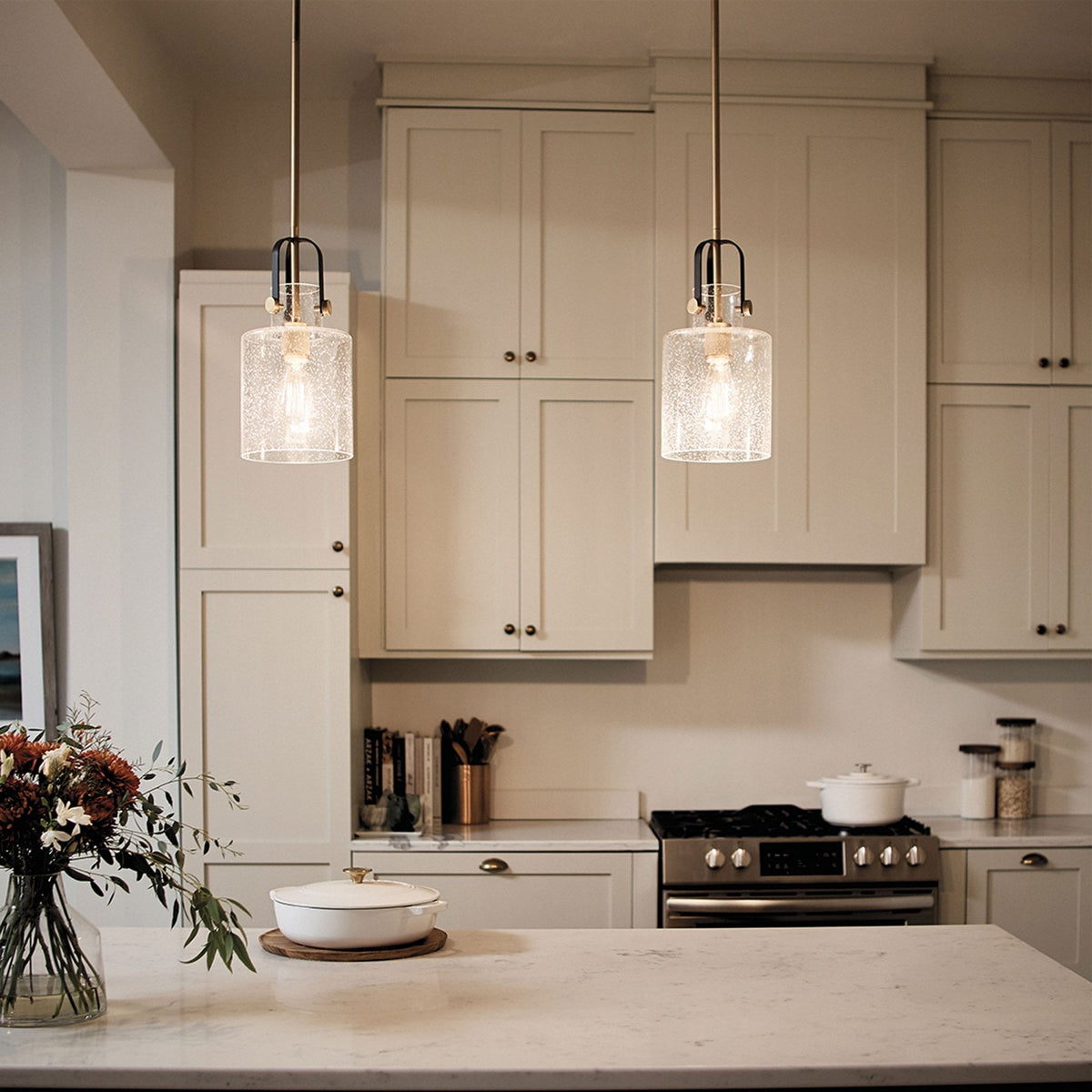 Kitner Single Drop Pendant in Natural Brass and Black with Clear Seeded Glass Shade