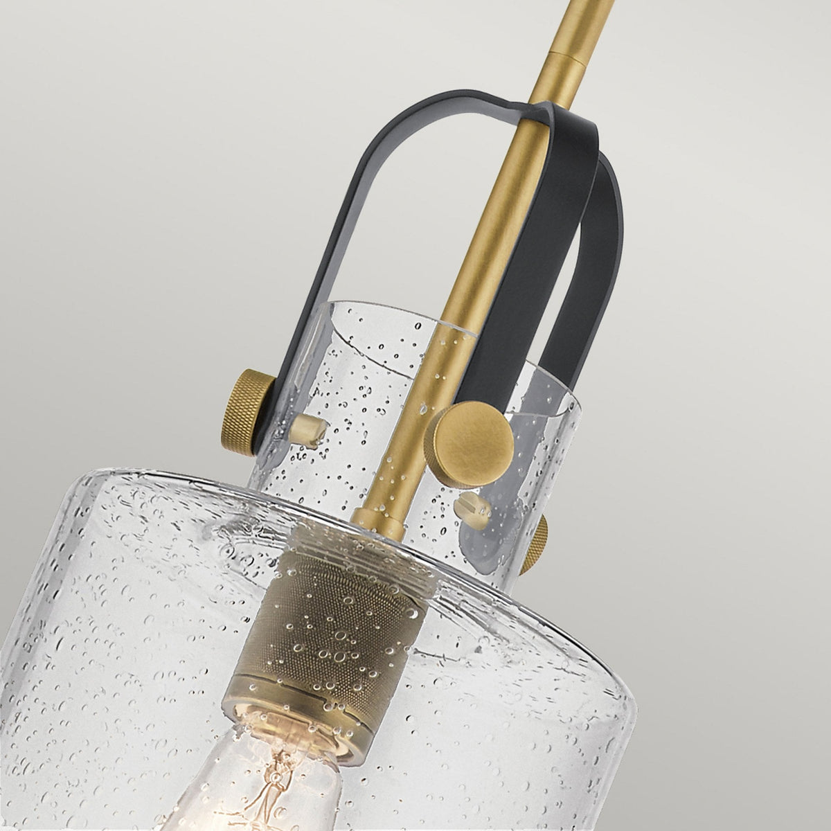 Kitner Single Drop Pendant in Natural Brass and Black with Clear Seeded Glass Shade
