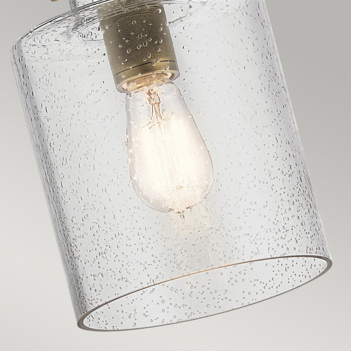 Kitner Single Drop Pendant in Natural Brass and Black with Clear Seeded Glass Shade