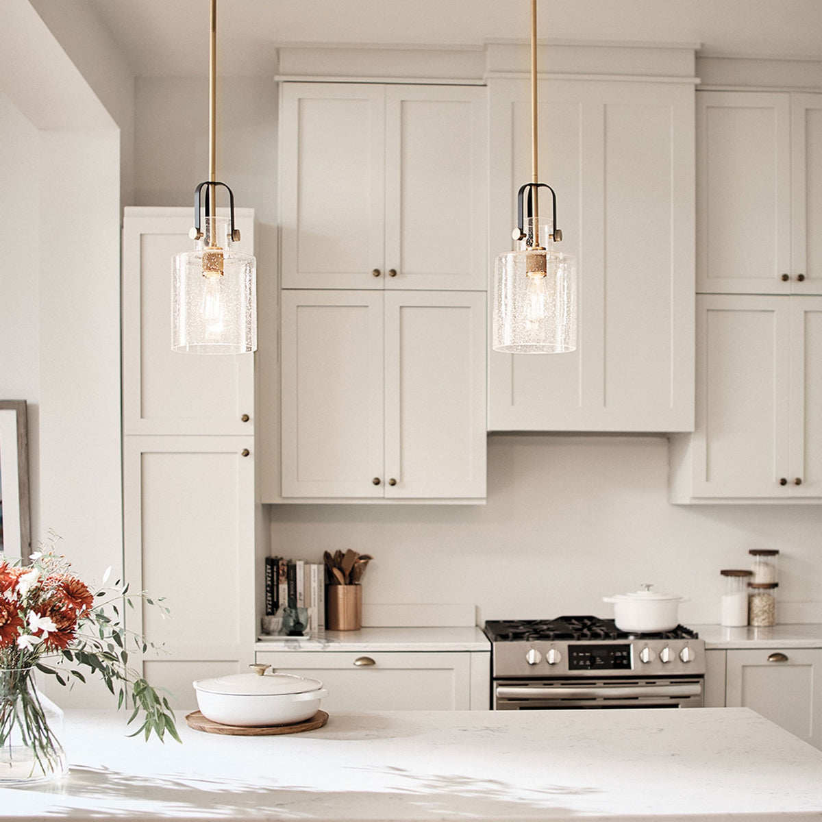 Kitner Single Drop Pendant in Natural Brass and Black with Clear Seeded Glass Shade