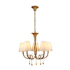 Paola 5 Light Chandelier In Painted Gold & Amber With Cream Fabric Shades