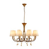 Paola 8 Light Chandelier In Painted Gold & Amber With Cream Fabric Shades