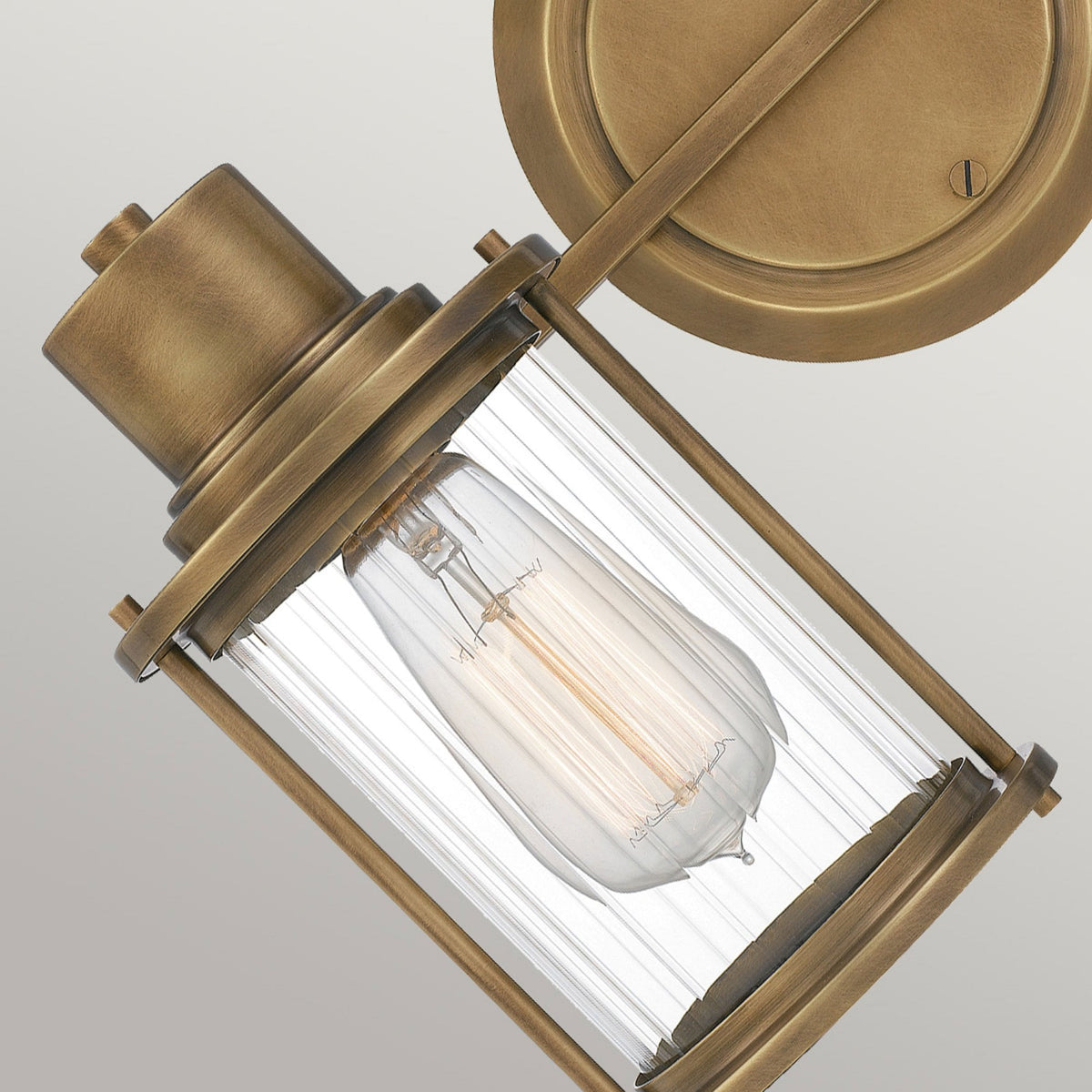 Riggs IP44 Twin Wall Light in Weathered Brass with Clear Ribbed Glass