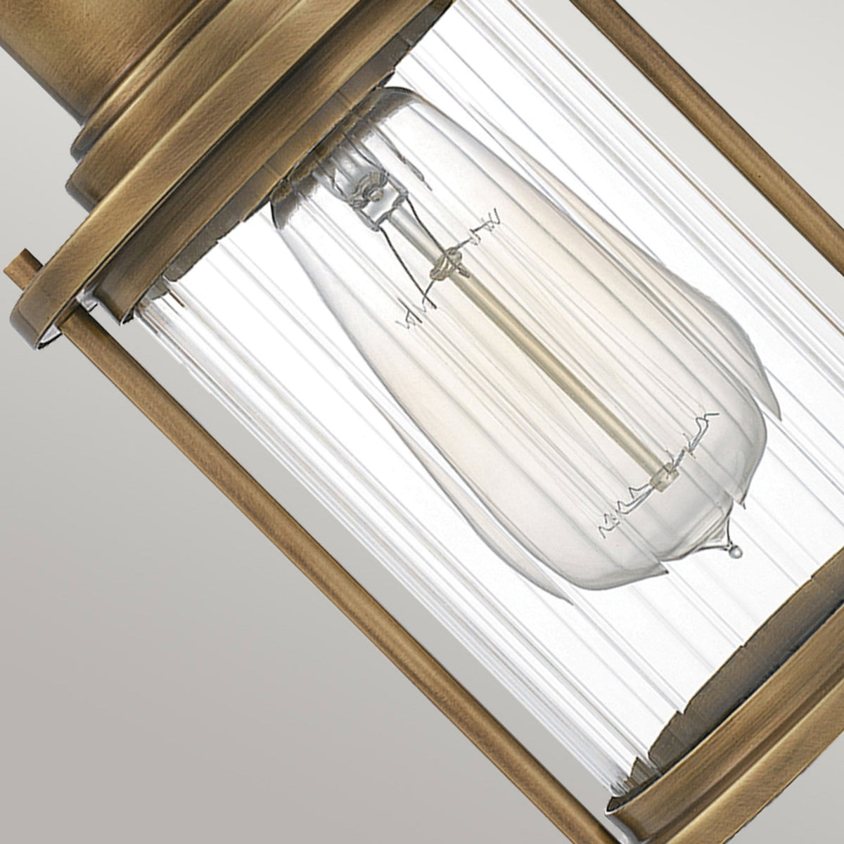 Riggs IP44 Triple Wall Light in Weathered Brass with Clear Ribbed Glass