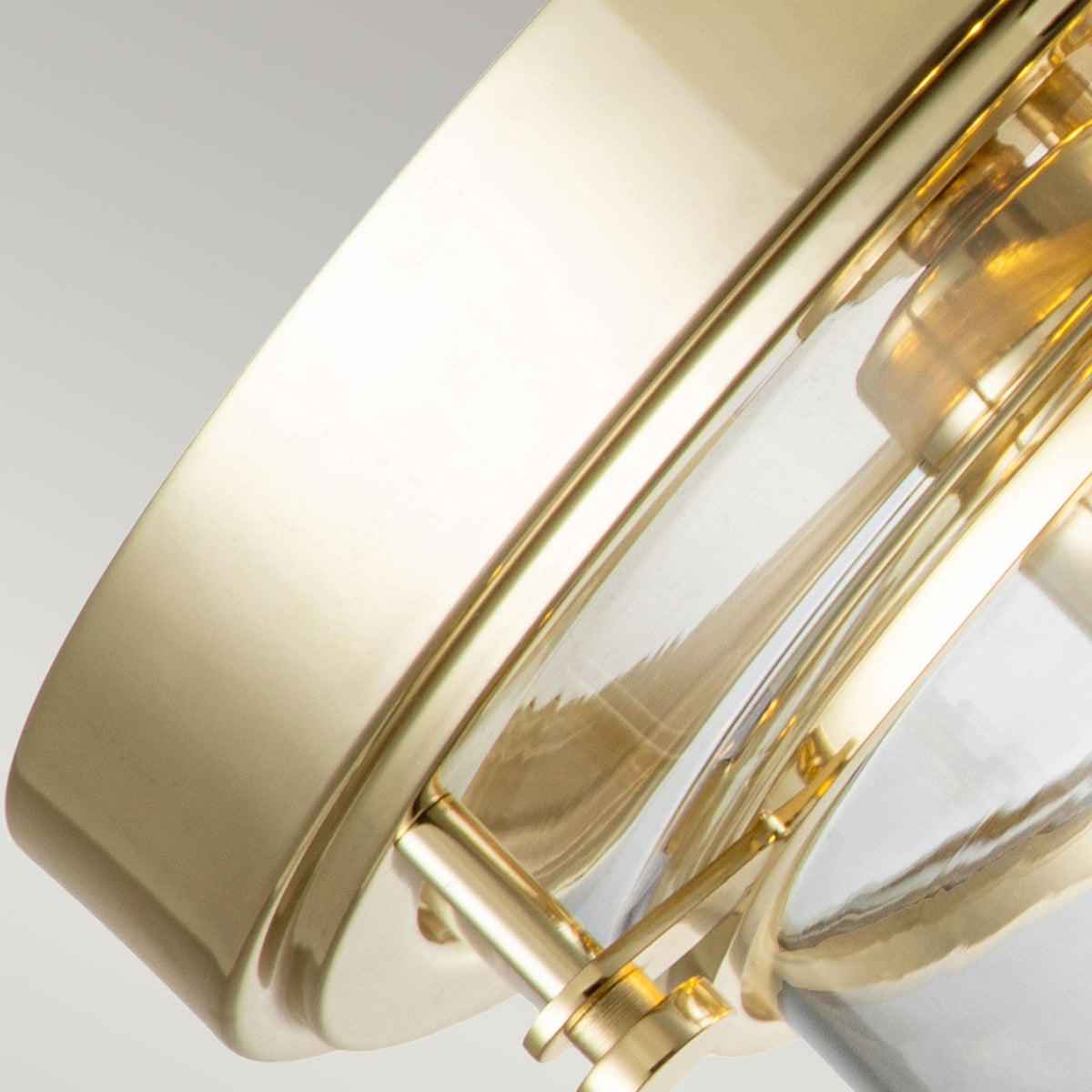 Whistling IP44 Ceiling Light in Polished Brass with Clear Glass Shade