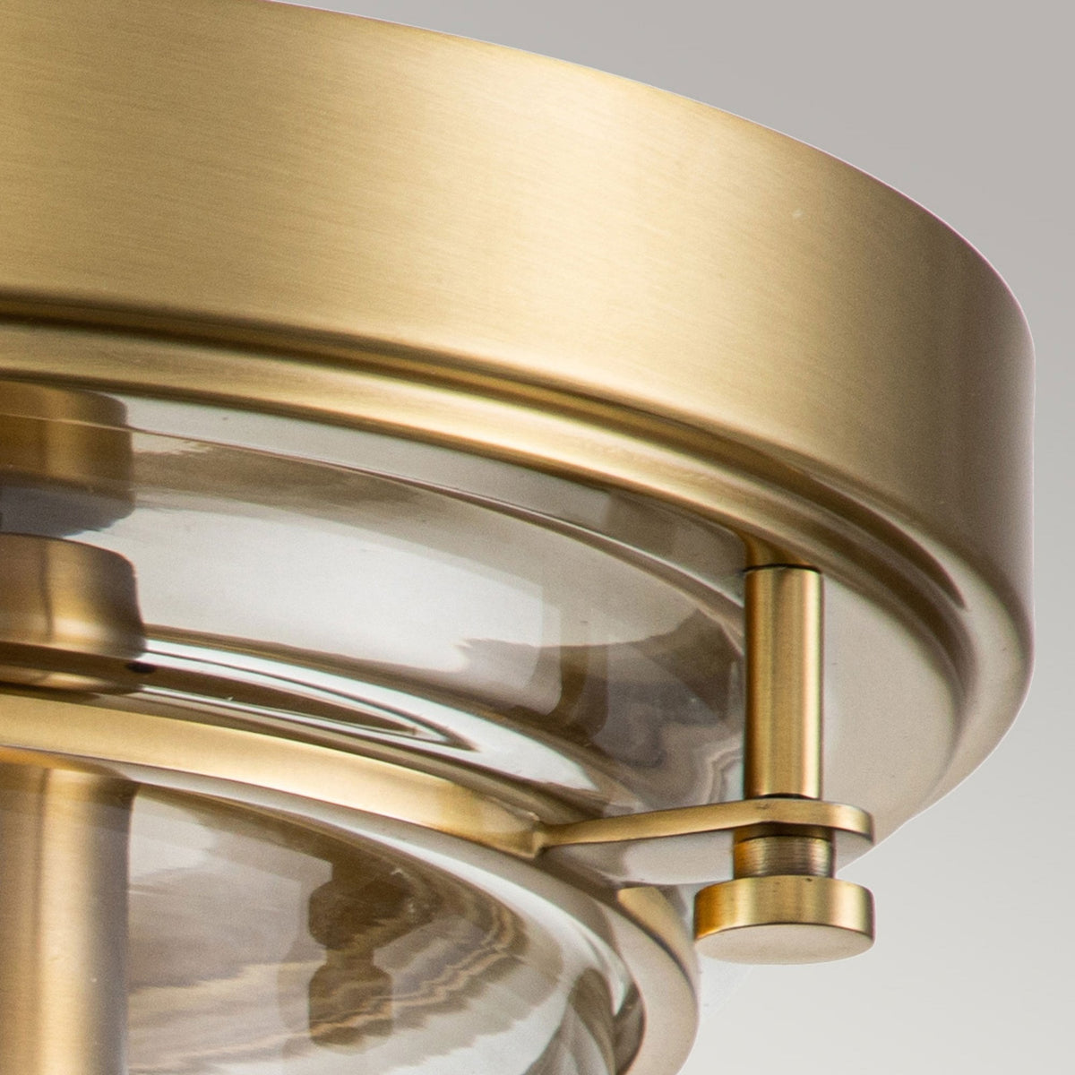 Whistling IP44 Ceiling Light in Brushed Brass with Clear Glass Shade