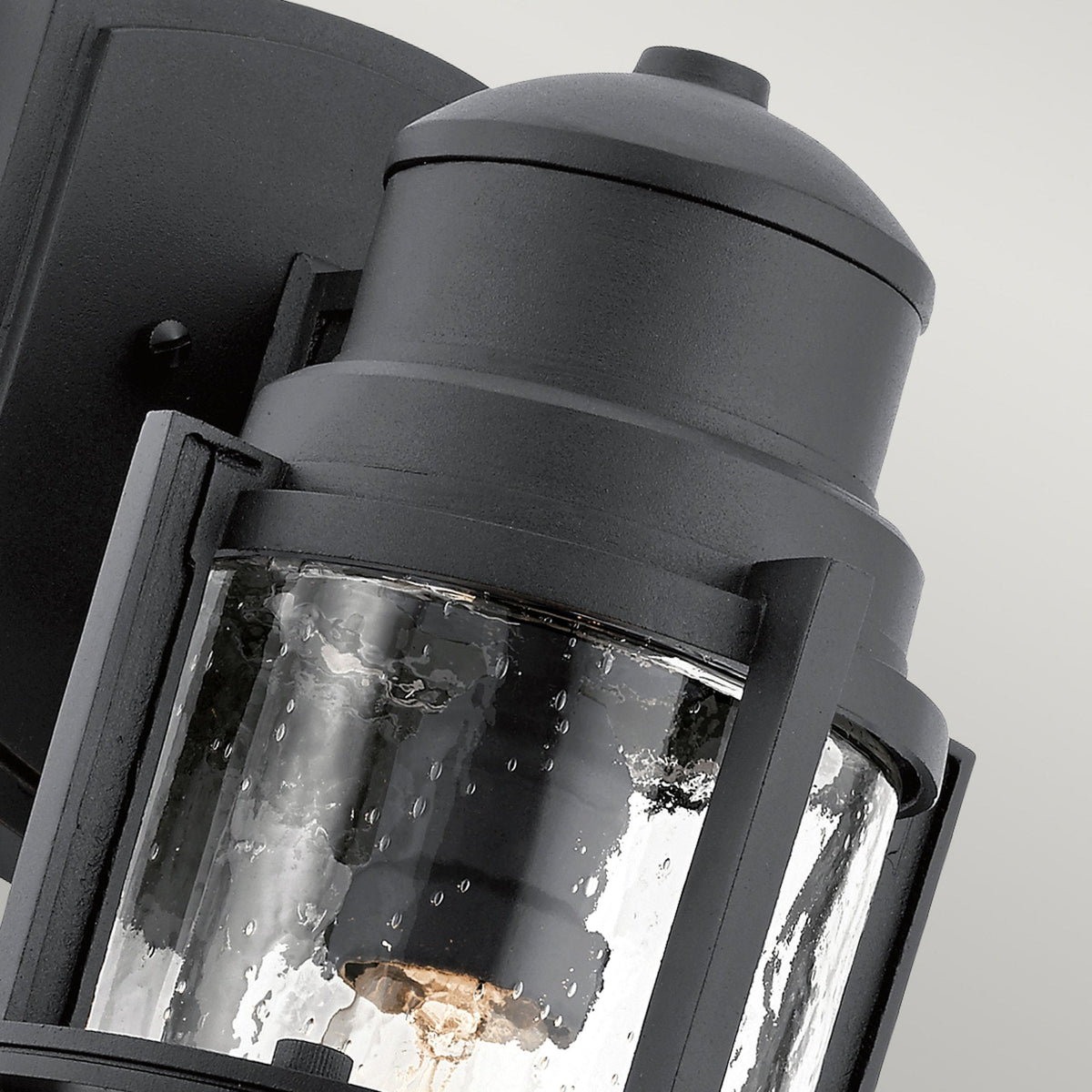 Suri IP44 Medium Coastal Wall Light in Textured Black with Seeded Glass