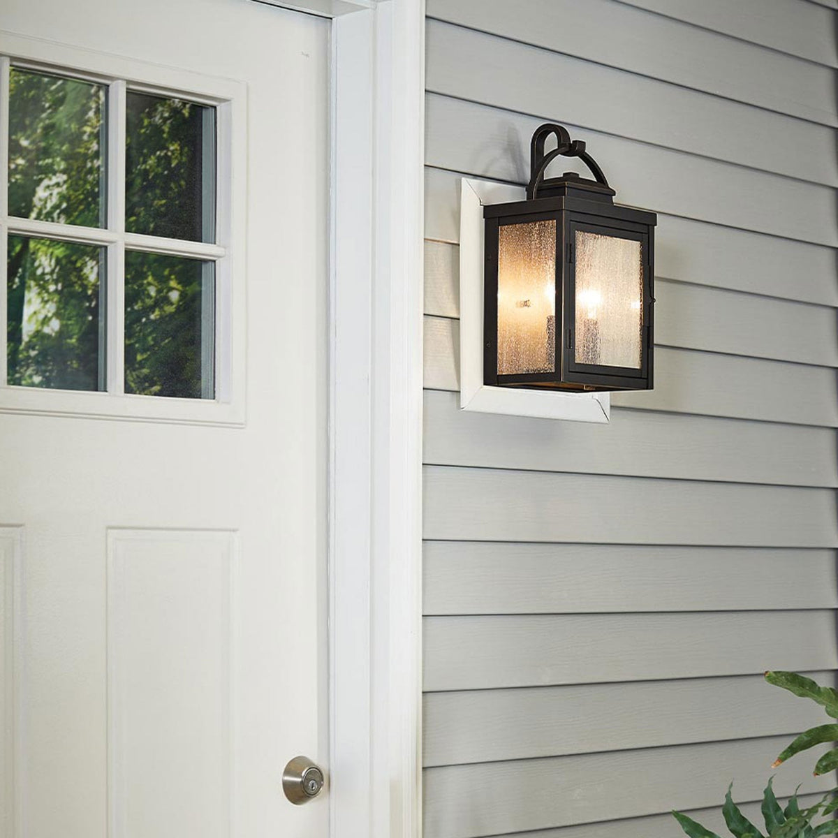 Carlson IP44 Medium Exterior Wall Light in Rubbed Bronze with Seeded Glass