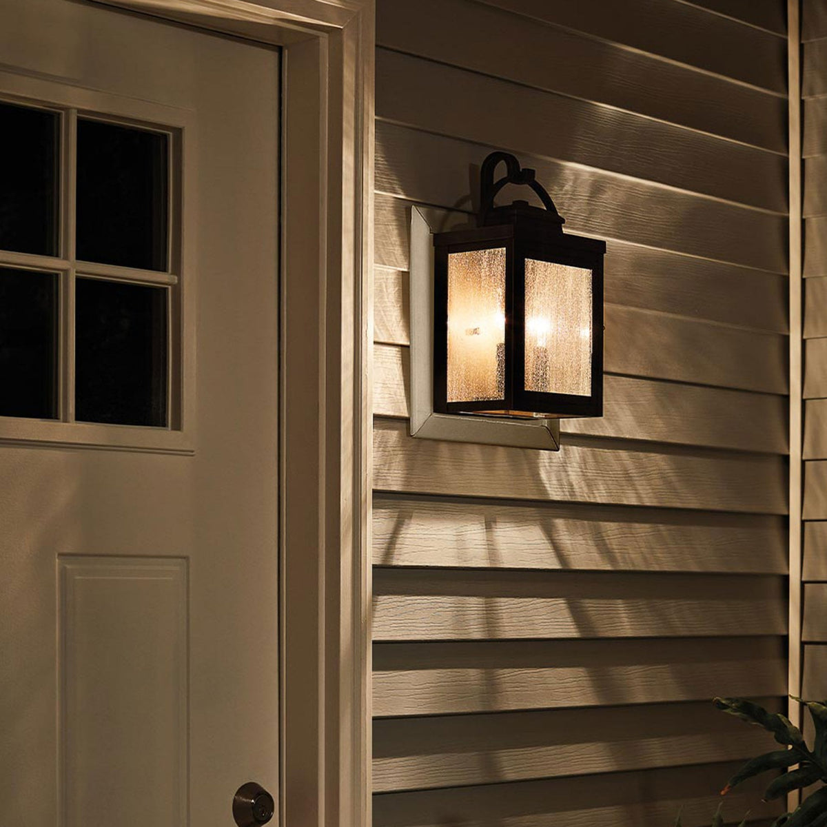 Carlson IP44 Medium Exterior Wall Light in Rubbed Bronze with Seeded Glass