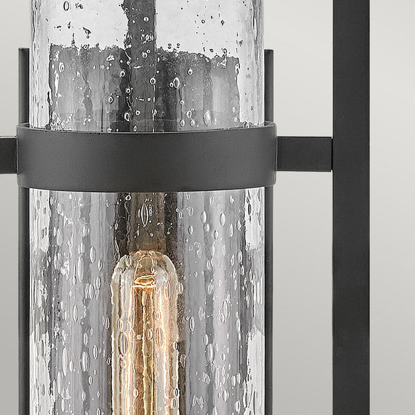 Cordillera IP44 Exterior Wall Light in Black with Seeded Tubular Glass