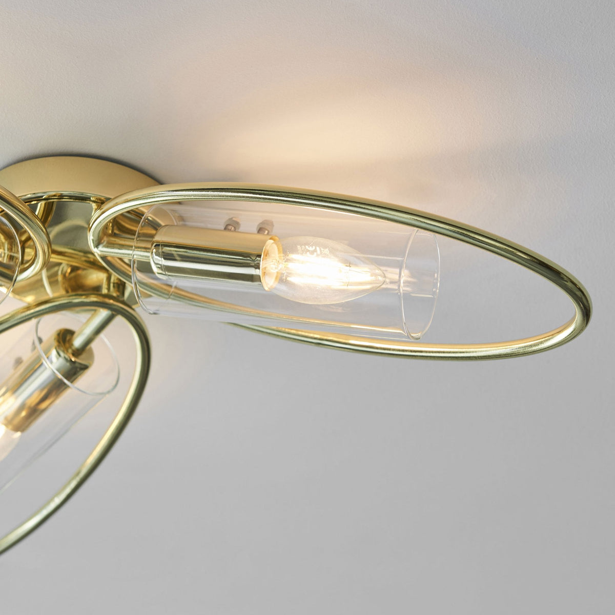 Amari Three Light Semi Flush in Polished Brass with Clear Glass Shades