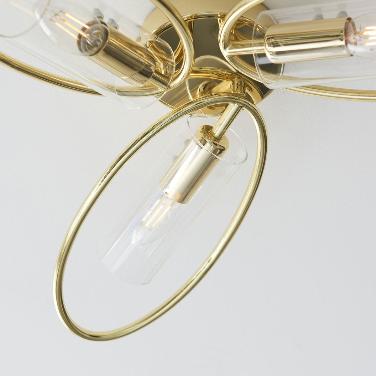 Amari Three Light Semi Flush in Polished Brass with Clear Glass Shades
