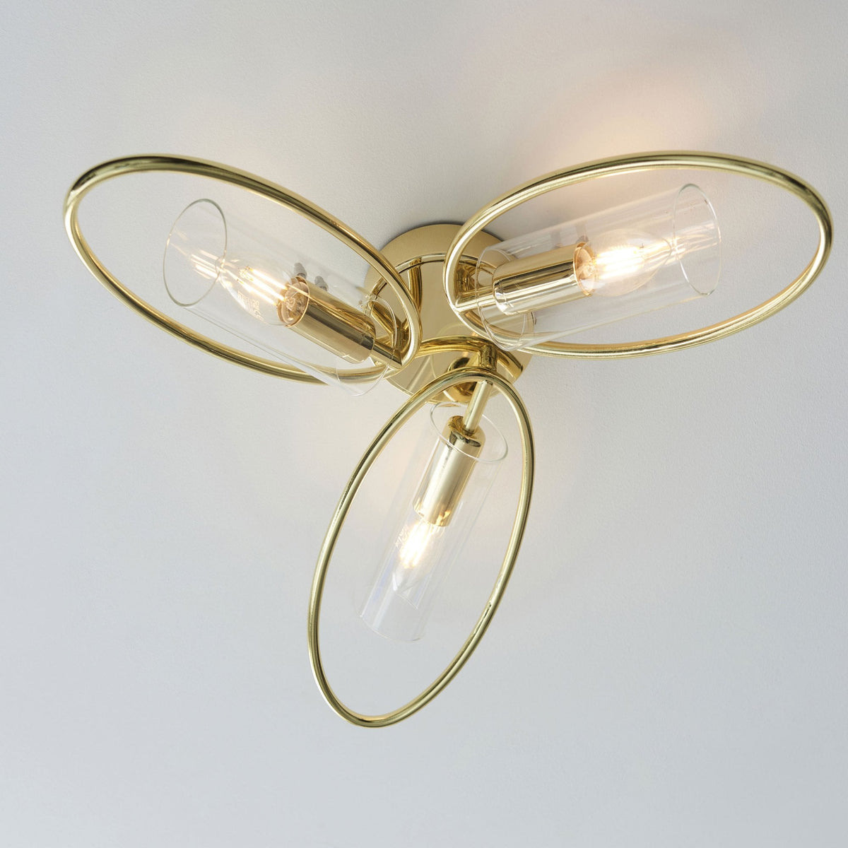 Amari Three Light Semi Flush in Polished Brass with Clear Glass Shades