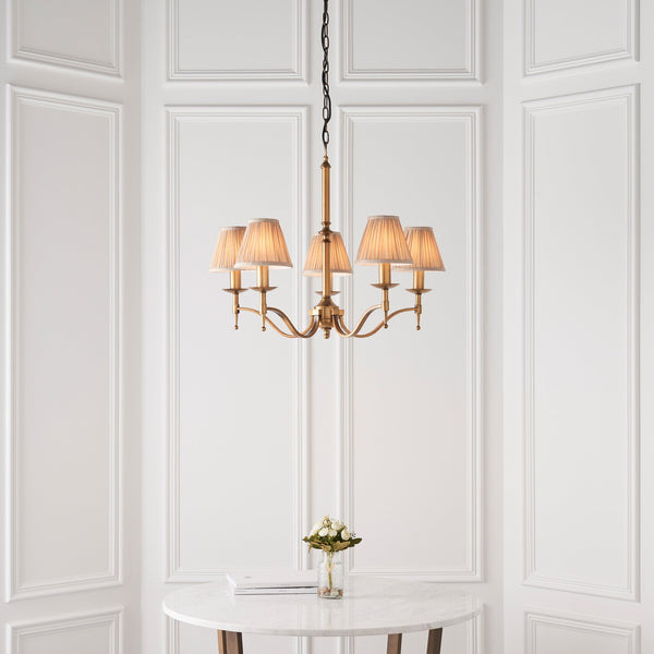 Stanford Five Light Pendant In Antique Brass With Beige Fabric Shades