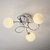 Delos Three Arm Ceiling Light in Polished Chrome with White Confetti Glass Shades