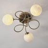 Delos Three Arm Ceiling Light in Antique Brass with White Confetti Glass Shades