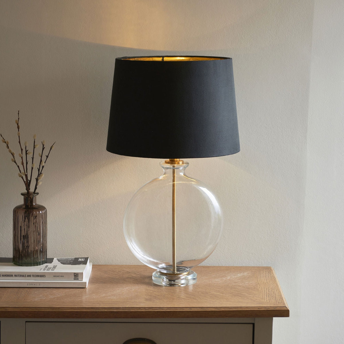 Gideon Table Lamp and Shade with Clear Glass Ellipsoid Base and Antique Brass Detailing