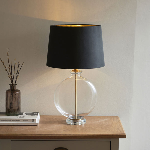 Gideon Table Lamp and Shade with Clear Glass Ellipsoid Base and Antique Brass Detailing