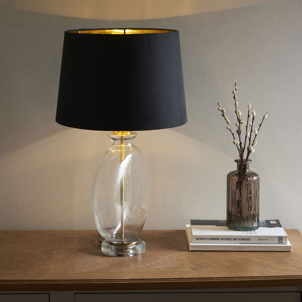 Gideon Table Lamp and Shade with Clear Glass Ellipsoid Base and Antique Brass Detailing