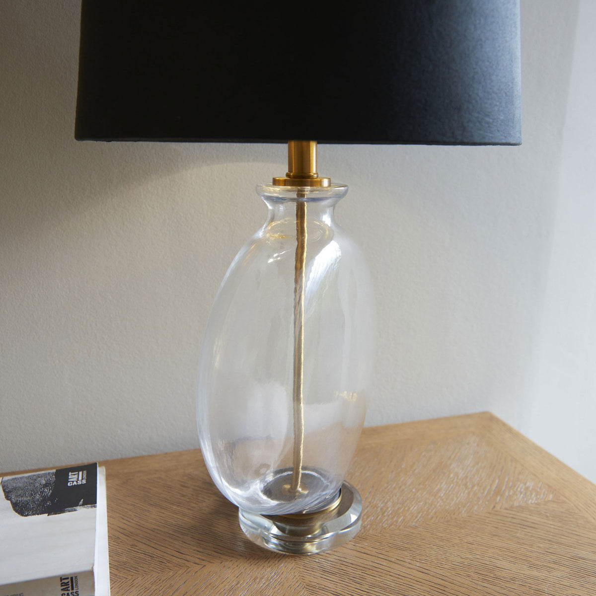 Gideon Table Lamp and Shade with Clear Glass Ellipsoid Base and Antique Brass Detailing