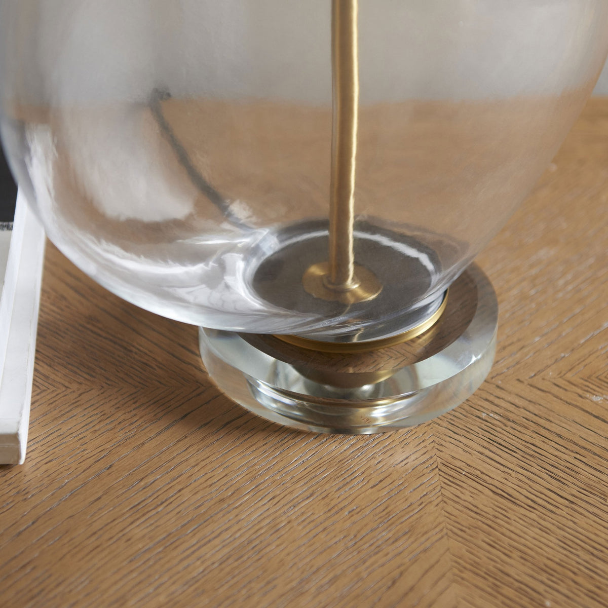 Gideon Table Lamp and Shade with Clear Glass Ellipsoid Base and Antique Brass Detailing