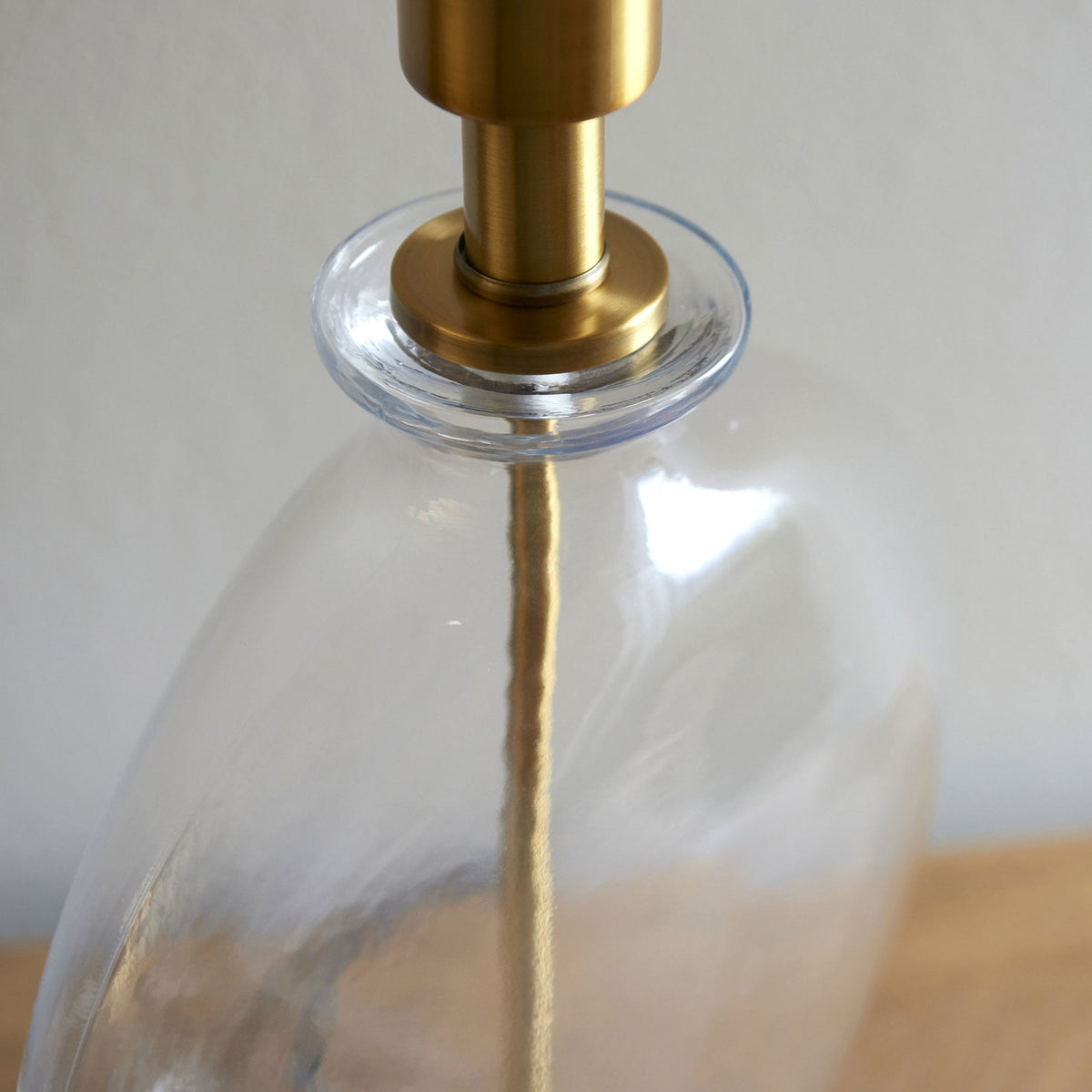 Gideon Table Lamp and Shade with Clear Glass Ellipsoid Base and Antique Brass Detailing