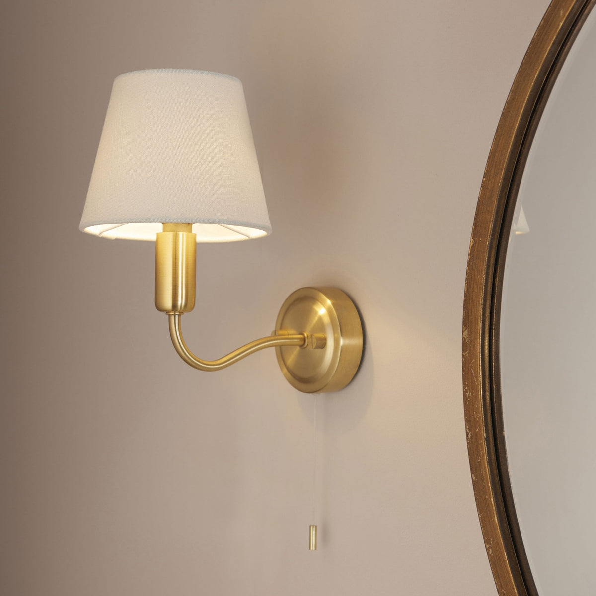 Conway Switched IP44 Bathroom Wall Light in Satin Brass with Ivory Fabric Shade