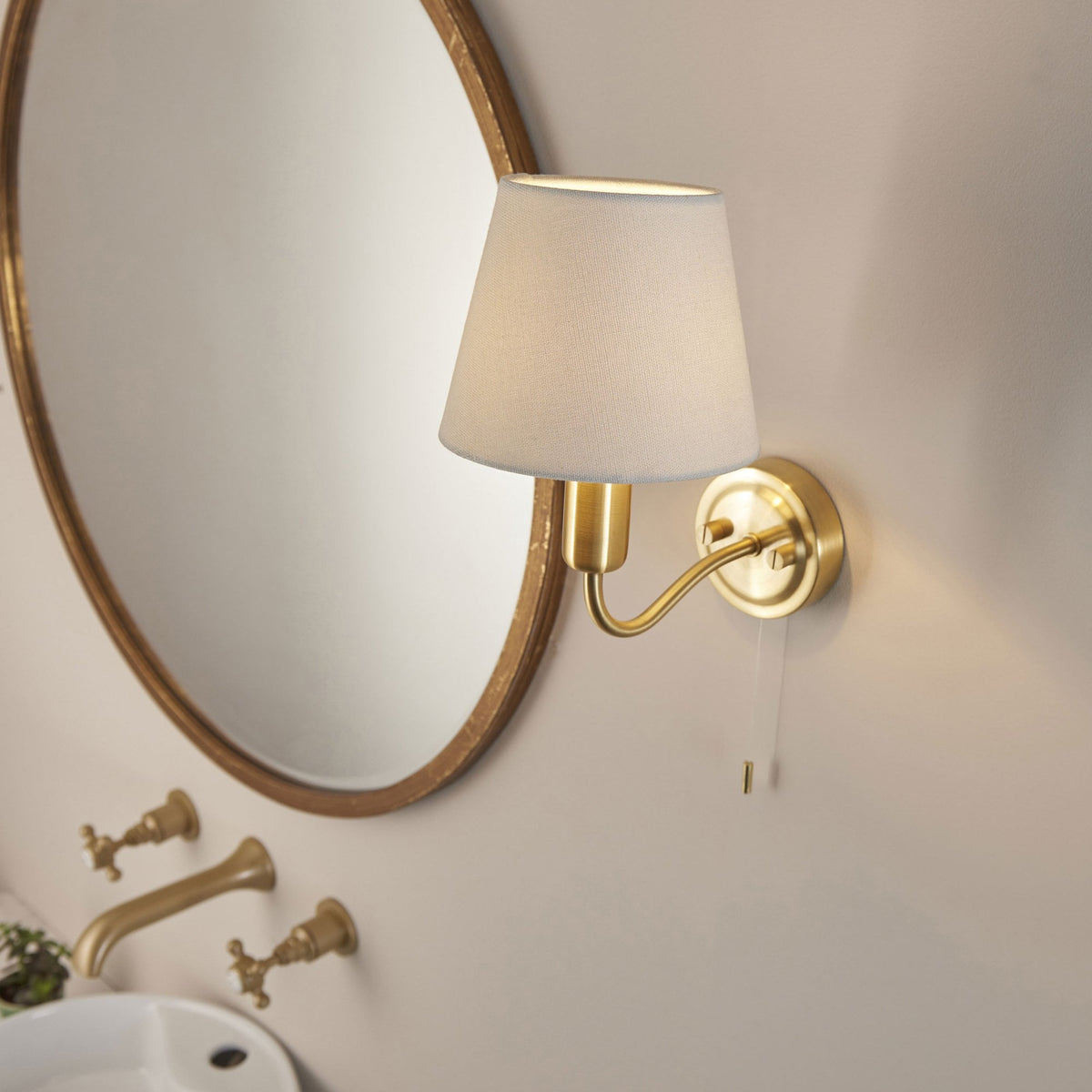 Conway Switched IP44 Bathroom Wall Light in Satin Brass with Ivory Fabric Shade