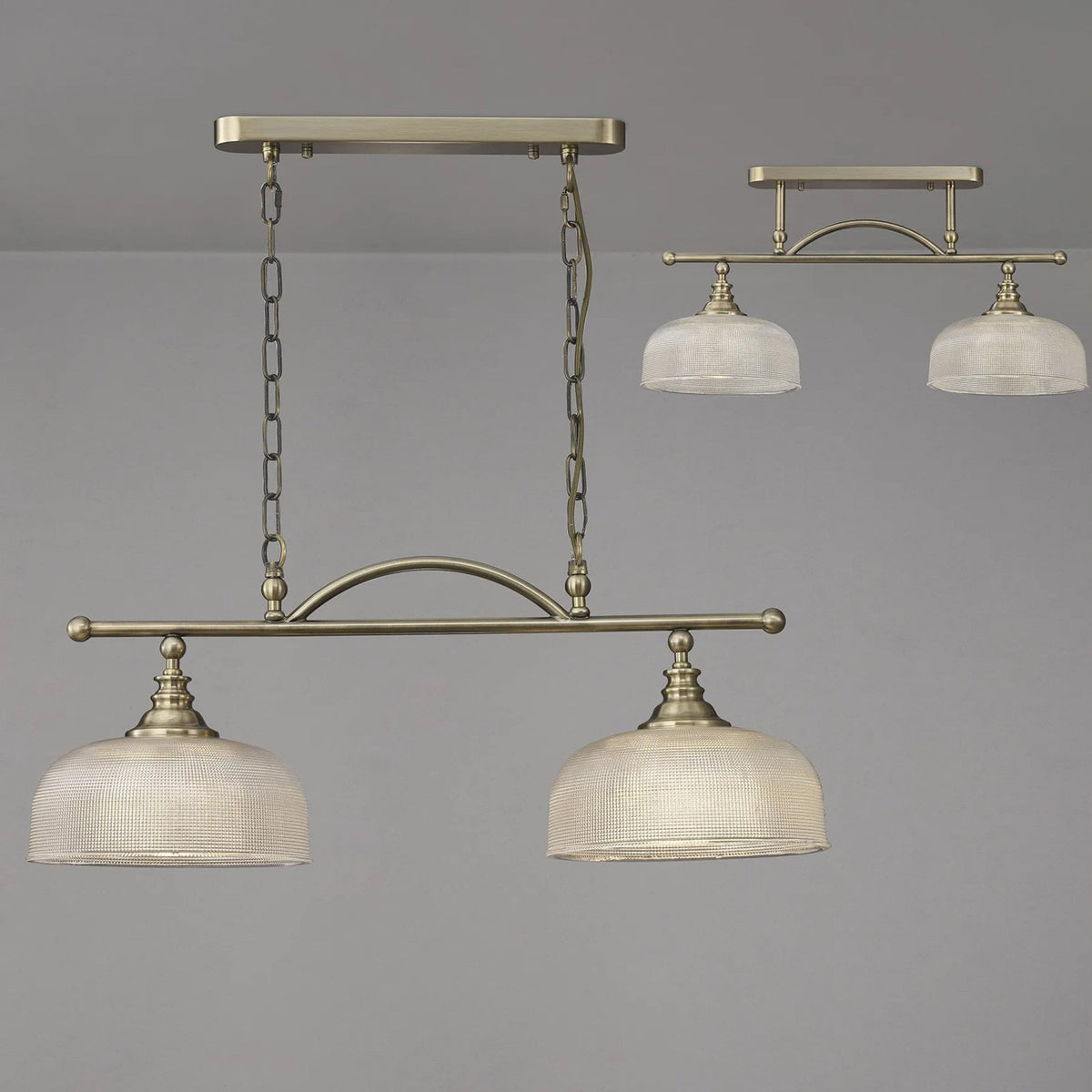 Stowford Two Light Pendant In Antique Brass & Clear Prismatic Glass