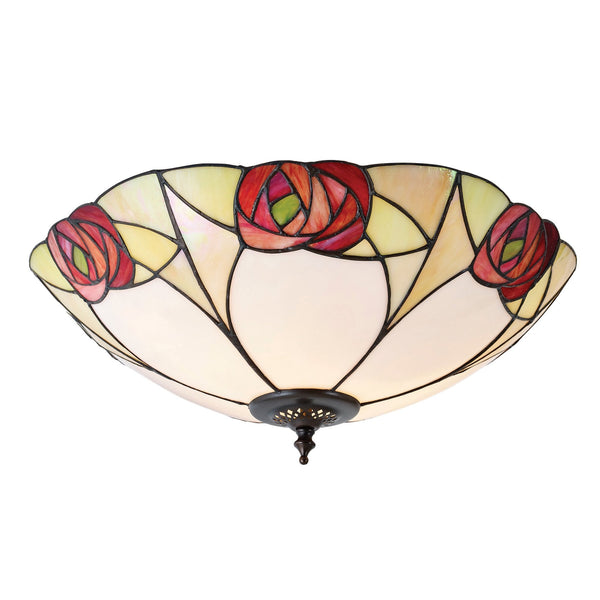A close-up of a ceiling light featuring a stained-glass rose design, radiating a warm glow.