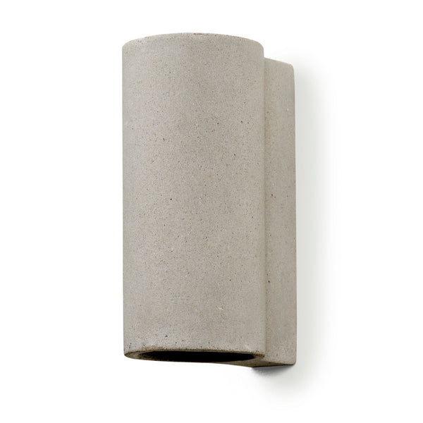 A modern cylindrical concrete up-and-down wall light, unlit, on a white background.