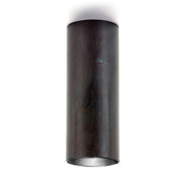 A black cylindrical ceiling light fixture from the front, showcasing its minimalist design.