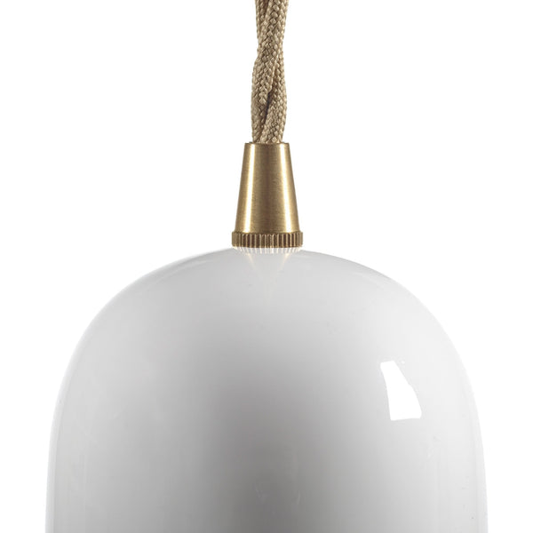 Close-up of the brass top and twisted cord of a white glass pendant light.