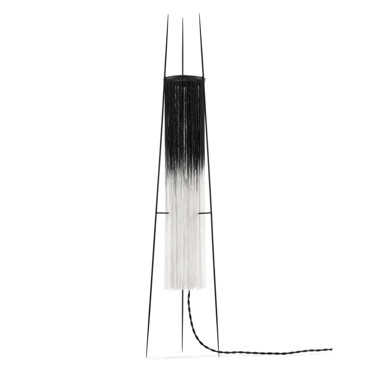 A black and white floor lamp with a minimalist design.