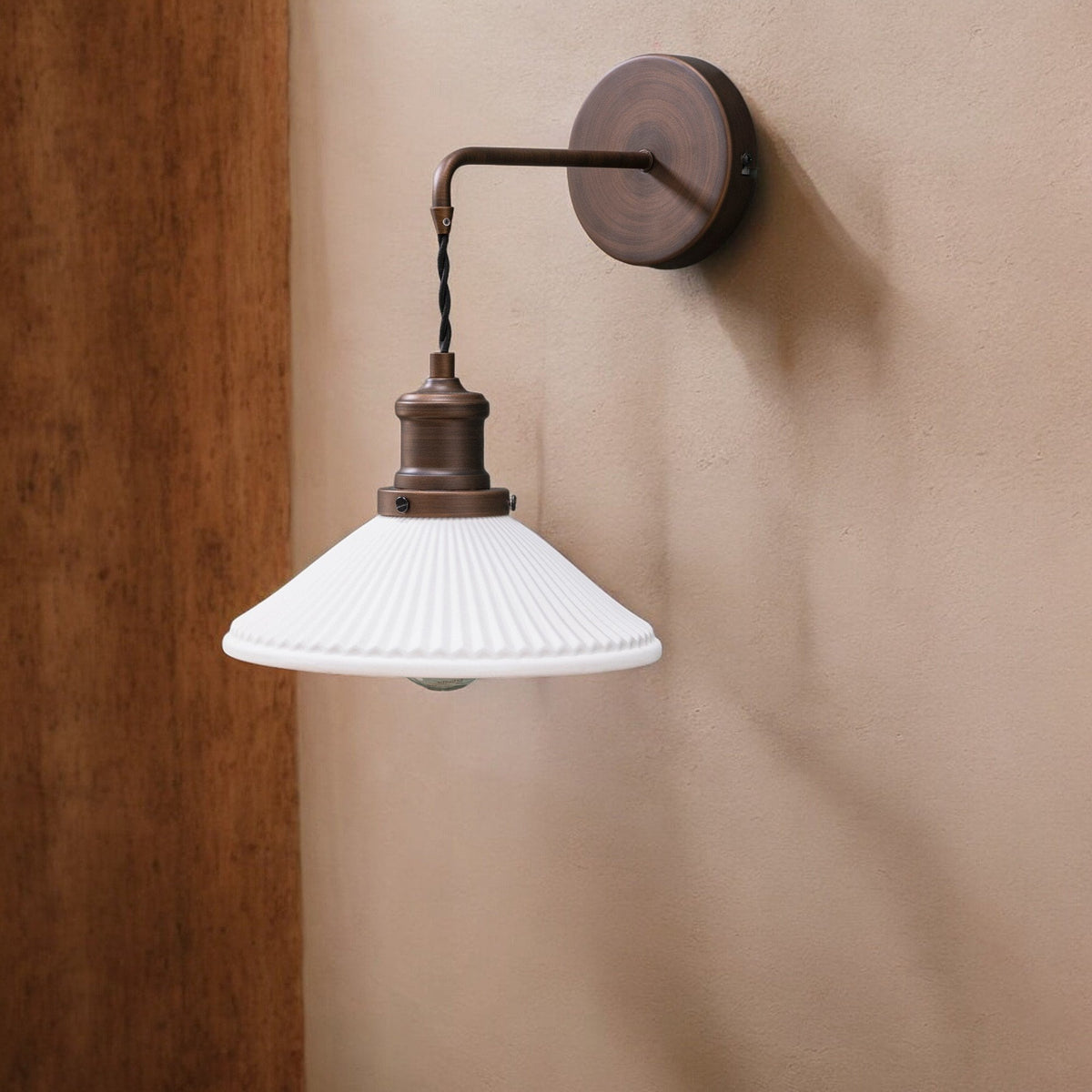 Beaulieu Ceramic Fluted Cone Wall Light in Antique Bronze