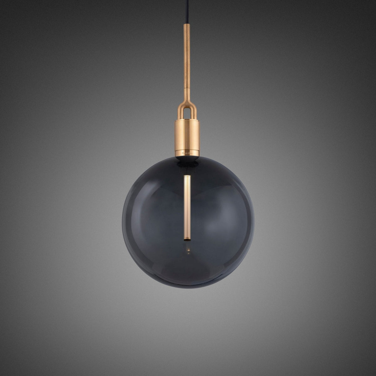 Forked Single Pendant in a Brass Finish with Large Smoked Globe
