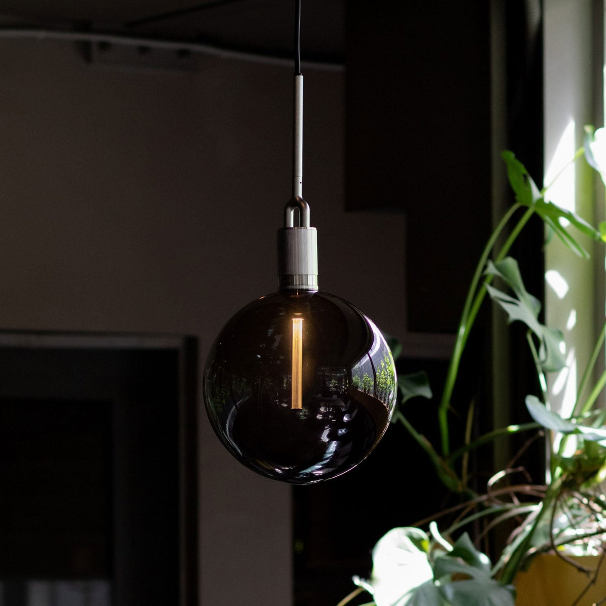 Forked Single Pendant in a Steel Finish with Large Smoked Globe